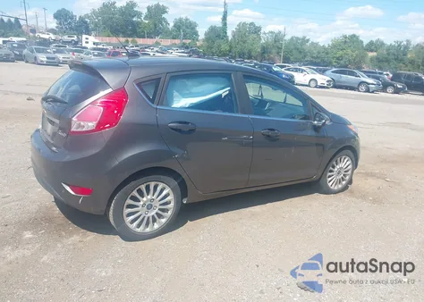2015 Ford Fiesta Titanium z USA, uszkodzony, nr VIN 3FADP4FJ0FM212901
